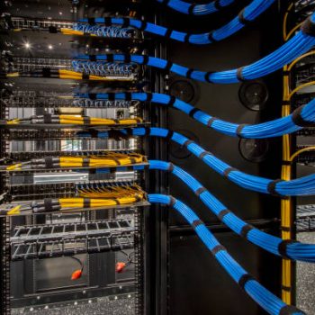 Fiber Optic and Cat 6 wiring in a server room.